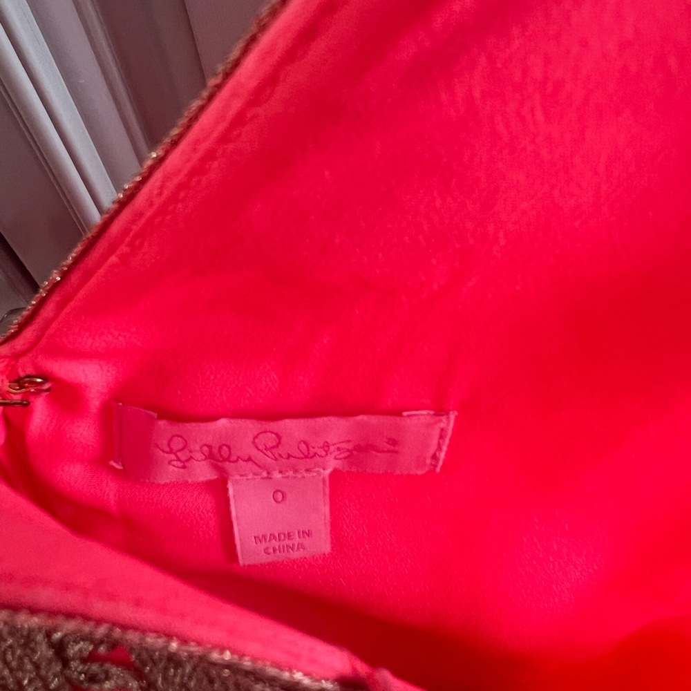 Lilly Pulitzer Bright Pink Dress with Gold Accent Detail.